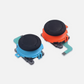 Two joystick components, one blue and one orange with black caps, on a white background.