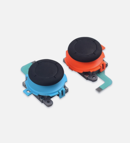 Two joystick components, one blue and one orange with black caps, on a white background.
