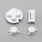 Set of white plastic components on a gray background